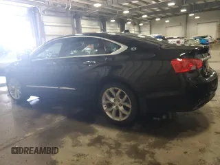 2014 Chevrolet Impala LTZ with VIN 2G1155S31E9275036, listed as a Copart auction lot 52099875 with 87,719 mi miles and Salvage title. Bid and sale history available at DreamBid. Image 2.