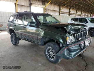 1995 Jeep Grand Cherokee Limited with VIN 1J4GZ78Y2SC723898, listed as a Copart auction lot 54142035 with 173,454 mi miles and Salvage Title. Bid and sale history available at carsss.com. Image 4.