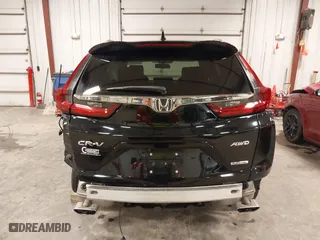 2021 Honda CR-V Touring with VIN 2HKRW2H9XMH653531, listed as a IAAI auction lot 41167970 with 32,228 mi miles. Bid and sale history available at carsss.com. Image 17.