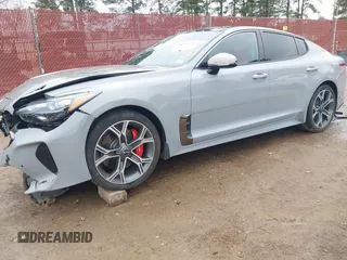 2018 Kia Stinger GT2 with VIN KNAE55LC7J6017223, listed as a IAAI auction lot 41356220 with 102,874 mi miles. Bid and sale history available at carsss.com. Image 2.