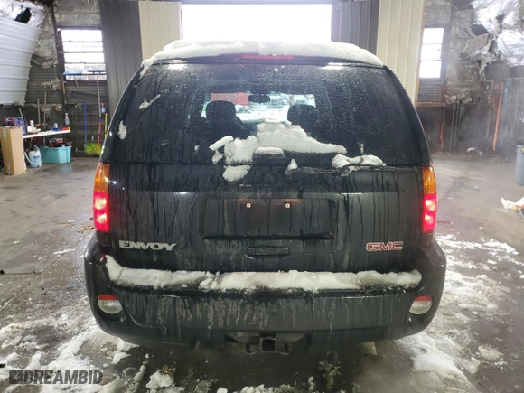 2005 GMC Envoy Denali with VIN 1GKET63M152386829, listed as a Copart auction lot 41901885 with 51,088 mi miles and Salvage Title. Bid and sale history available at carsss.com. Image 6.