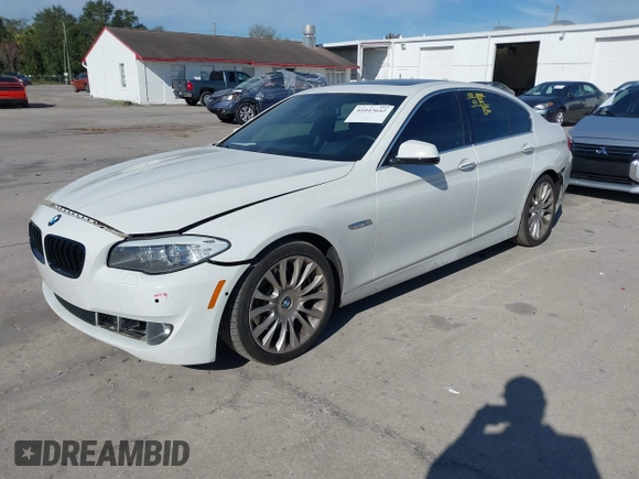 2013 BMW 5 Series 535i with VIN WBAFR7C59DC827660, listed as a IAAI auction lot 41047642 with 131,917 mi miles and . Bid and sale history available at DreamBid. Image 18.
