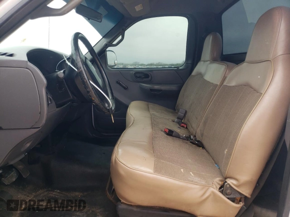 2002 Ford F-150 XL with VIN 1FTRF17W32KB68406, listed as a Copart auction lot 86059454 with 322,076 mi miles and Salvage Title. Bid and sale history available at carsss.com. Image 7.