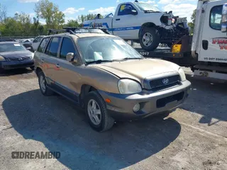 2004 Hyundai Santa Fe GLS z VIN KM8SC73EX4U814067, wystawiony jako IAAI lot #40404373 z przebiegiem 182 101 mil mil oraz . Historia ofert i sprzedaży dostępna na DreamBid. Obrazek 1.