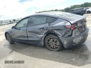 2023 Tesla Model 3 с VIN 5YJ3E1EA7PF449077, выставлен на аукционе Copart как лот 56821975 с пробегом 42 037 миль миль и Списание • Salvage title. История ставок и продаж доступна на DreamBid. Изображение 2.