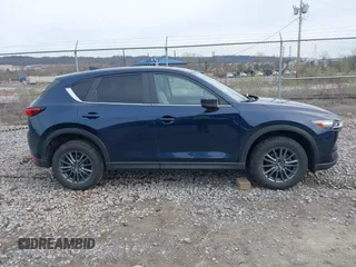 2019 Mazda CX-5 Touring with VIN JM3KFBCM5K0689948, listed as a IAAI auction lot 41976266 with 74,812 mi miles. Bid and sale history available at carsss.com. Image 13.