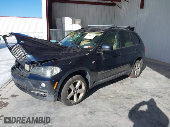 2010 BMW X5 35d with VIN 5UXFF0C50ALJ99887, listed as a IAAI auction lot 41585772 with 96,983 mi miles. Bid and sale history available at carsss.com. Image 2.
