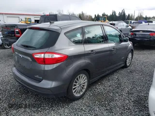 2013 Ford C-Max SE z VIN 1FADP5AU7DL511937, wystawiony jako IAAI lot #41909936 z przebiegiem 165 061 mil mil oraz . Historia ofert i sprzedaży dostępna na DreamBid. Obrazek 4.