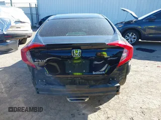 2019 Honda Civic Sport with VIN 19XFC2F80KE033598, listed as a IAAI auction lot 41732698 with 101,664 mi miles and . Bid and sale history available at DreamBid. Image 16.