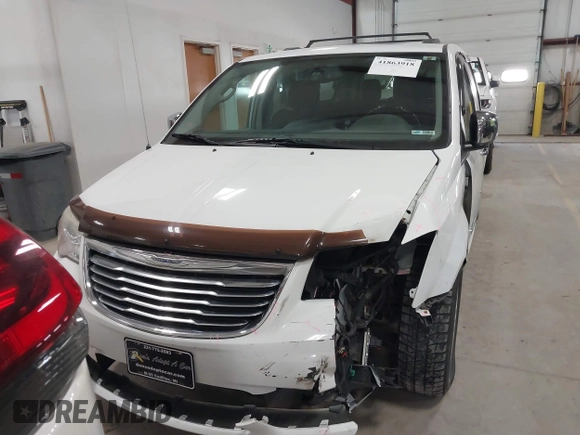 2014 Chrysler Town & Country Limited with VIN 2C4RC1GG7ER178802, listed as a IAAI auction lot 41863918 with 103,777 mi miles and . Bid and sale history available at DreamBid. Image 13.