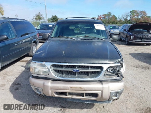 2000 Ford Explorer Eddie Bauer z VIN 1FMZU64EXYZA74923, wystawiony jako IAAI lot #41504088 z przebiegiem 254 021 mil mil oraz . Historia ofert i sprzedaży dostępna na DreamBid. Obrazek 12.
