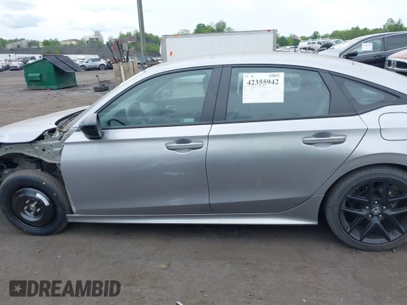 2023 Honda Civic Sport with VIN 2HGFE2F55PH501595, listed as a IAAI auction lot 42355942 with 8,924 mi miles and . Bid and sale history available at DreamBid. Image 14.