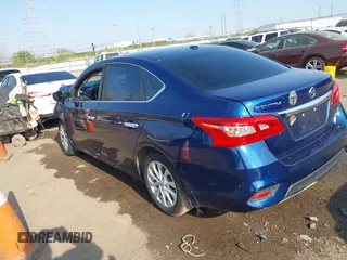 2018 Nissan Sentra SV with VIN 3N1AB7AP7JL643987, listed as a IAAI auction lot 42070616 with 199,273 mi miles. Bid and sale history available at carsss.com. Image 3.