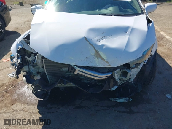 2010 Honda Insight EX with VIN JHMZE2H79AS039292, listed as a IAAI auction lot 41880303 with Not Provided miles and . Bid and sale history available at DreamBid. Image 6.