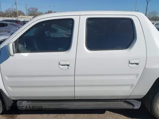 2008 Honda Ridgeline RTL z VIN 2HJYK165X8H518321, wystawiony jako IAAI lot #41763883 z przebiegiem 97 027 mil mil oraz . Historia ofert i sprzedaży dostępna na DreamBid. Obrazek 14.