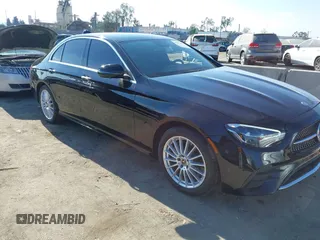 2021 Mercedes-Benz E-Class E 350 with VIN W1KZF8DB0MA889890, listed as a IAAI auction lot 41317094 with 63,075 mi miles. Bid and sale history available at carsss.com. Image 1.