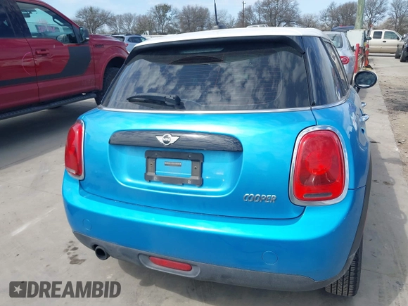 2017 MINI Hardtop 4 Door Cooper with VIN WMWXU1C53H2E17614, listed as a IAAI auction lot 41686204 with 53,409 mi miles and . Bid and sale history available at DreamBid. Image 17.