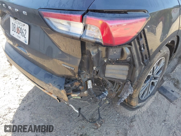 2020 Ford Escape Titanium Hybrid with VIN 1FMCU9DZ2LUA86600, listed as a IAAI auction lot 42059830 with 76,998 mi miles and . Bid and sale history available at DreamBid. Image 6.
