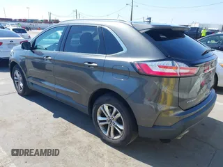 2019 Ford Edge SEL with VIN 2FMPK3J9XKBB76512, listed as a IAAI auction lot 42498683 with 119,513 mi miles and . Bid and sale history available at DreamBid. Image 3.