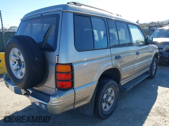 1997 Mitsubishi Montero z VIN JA4MR41R3VJ006477, wystawiony jako IAAI lot #41326277 z przebiegiem 239 378 mil mil oraz . Historia ofert i sprzedaży dostępna na DreamBid. Obrazek 4.