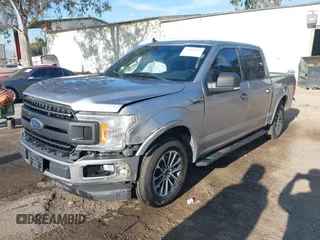 2020 Ford F-150 XL with VIN 1FTEW1C49LKD40054, listed as a IAAI auction lot 41837928 with 163,666 mi miles. Bid and sale history available at carsss.com. Image 2.