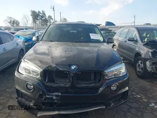 2014 BMW X5 sDrive35i with VIN 5UXKR2C50E0H31926, listed as a IAAI auction lot 41838021 with 125,813 mi miles. Bid and sale history available at carsss.com. Image 12.