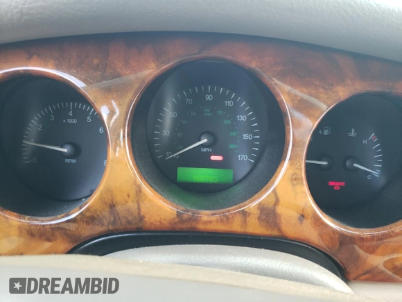 1998 Jaguar XJ with VIN SAJHX1242WC845736, listed as a Copart auction lot 82006044 with 188,785 mi miles and Salvage title. Bid and sale history available at DreamBid. Image 9.