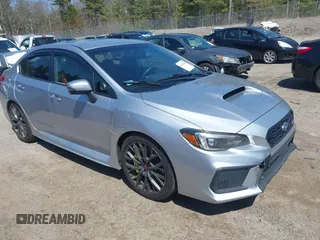 2019 Subaru WRX STI z VIN JF1VA2R66K9812493, wystawiony jako IAAI lot #42068360 z przebiegiem 100 689 mil mil oraz . Historia ofert i sprzedaży dostępna na DreamBid. Obrazek 1.