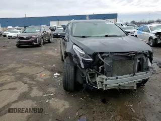 2023 Cadillac XT5 AWD Sport with VIN 1GYKNHRS4PZ232257, listed as a Copart auction lot 45865565 with 26,522 mi miles and Non repairable. Bid and sale history available at DreamBid. Image 12.