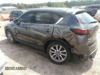2019 Mazda CX-5 Grand Touring with VIN JM3KFBDM7K0606860, listed as a IAAI auction lot 41936338 with 93,057 mi miles. Bid and sale history available at carsss.com. Image 3.