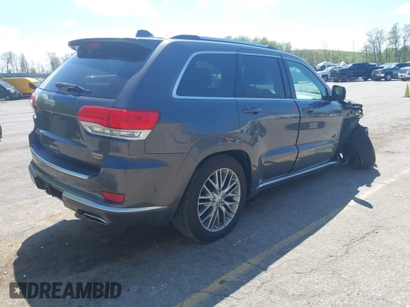 2017 Jeep Grand Cherokee Summit with VIN 1C4RJFJT9HC759417, listed as a IAAI auction lot 42199460 with 129,113 mi miles and . Bid and sale history available at DreamBid. Image 4.