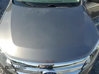 2012 Ford Fusion SEL with VIN 3FAHP0JA7CR387288, listed as a Copart auction lot 56968885 with 169,802 mi miles and Salvage title. Bid and sale history available at DreamBid. Image 11.