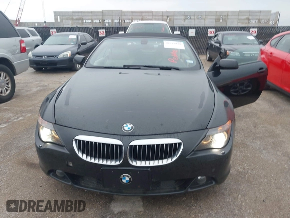 2006 BMW 6 Series 650Ci z VIN WBAEK13416CN79394, wystawiony jako IAAI lot #42420470 z przebiegiem 114 720 mil mil oraz . Historia ofert i sprzedaży dostępna na DreamBid. Obrazek 6.