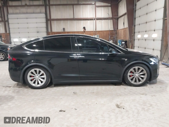 2019 Tesla Model X P90D with VIN 5YJXCAE4XKF180356, listed as a IAAI auction lot 42087926 with 79,041 mi miles. Bid and sale history available at carsss.com. Image 12.
