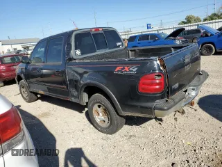2002 Ford F-150 XLT with VIN 1FTRW08L82KE27440, listed as a Copart auction lot 76366864 with 253,433 mi miles and Clean Title. Bid and sale history available at carsss.com. Image 2.