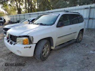 2002 GMC Envoy SLT with VIN 1GKDS13S822460095, listed as a Copart auction lot 77004764 with 267,716 mi miles and Salvage Title. Bid and sale history available at carsss.com. Image 1.