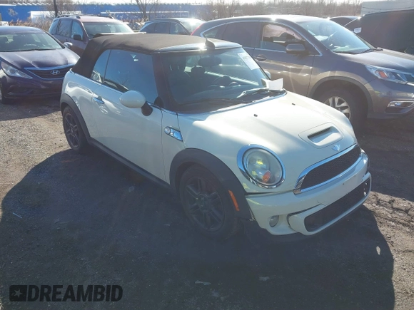 2011 MINI Convertible S with VIN WMWZP3C54BTX82748, listed as a IAAI auction lot 41817396 with 113,458 mi miles and . Bid and sale history available at DreamBid. Image 1.