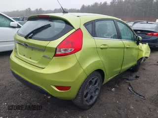 2011 Ford Fiesta SES with VIN 3FADP4FJ8BM107209, listed as a IAAI auction lot 41838522 with 142,730 mi miles. Bid and sale history available at carsss.com. Image 4.