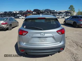 2016 Mazda CX-5 Sport with VIN JM3KE2BE9G0915168, listed as a IAAI auction lot 41482749 with 86,802 mi miles and . Bid and sale history available at carsss.com. Image 16.
