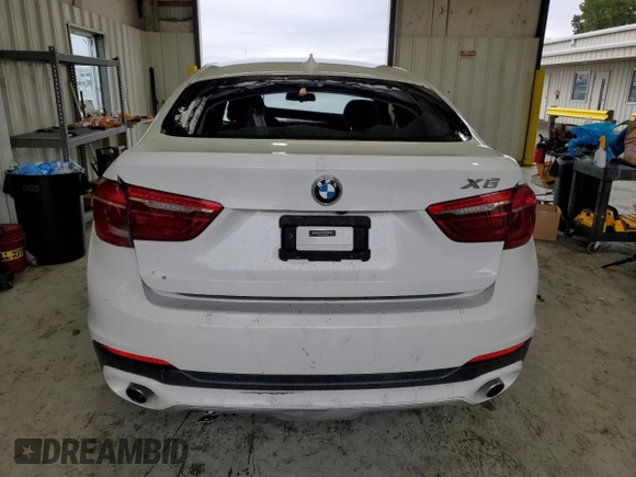 2015 BMW X6 sDrive35i with VIN 5UXKU0C50F0F91865, listed as a Copart auction lot 82128374 with 122,395 mi miles and Salvage Title. Bid and sale history available at carsss.com. Image 6.