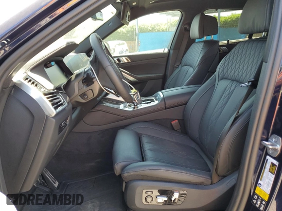 2023 BMW X6 M50i with VIN 5UXCY8C09P9P28422, listed as a Copart auction lot 52818133 with 4,131 mi miles and Salvage Title. Bid and sale history available at carsss.com. Image 7.