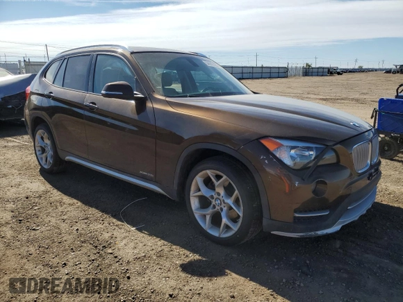 2015 BMW X1 xDrive28i z VIN WBAVL1C5XFVY35610, wystawiony jako Copart lot #54063125 z przebiegiem 115 279 mil mil oraz Szkoda całkowita • Salvage title. Historia ofert i sprzedaży dostępna na DreamBid. Obrazek 4.