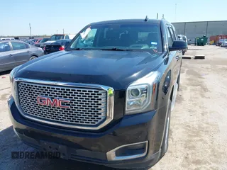 2016 GMC Yukon XL Denali with VIN 1GKS2HKJ2GR111246, listed as a IAAI auction lot 41834364 with 73,418 mi miles. Bid and sale history available at carsss.com. Image 6.