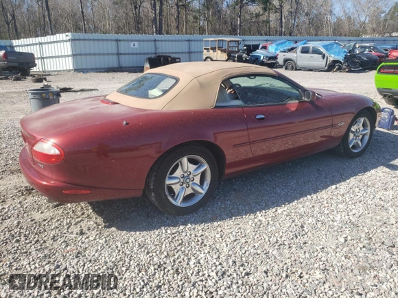 1999 Jaguar XK z VIN SAJGX2043XC032962, wystawiony jako Copart lot #49312155 z przebiegiem 74 662 mil mil oraz Szkoda całkowita • Salvage title. Historia ofert i sprzedaży dostępna na DreamBid. Obrazek 3.
