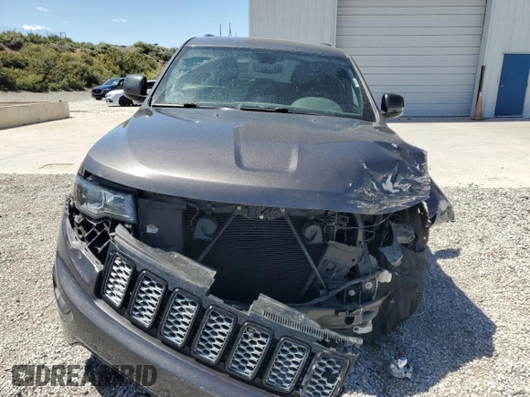2018 Jeep Grand Cherokee Altitude with VIN 1C4RJFAG5JC320742, listed as a Copart auction lot 56988195 with 140,320 mi miles and Salvage title. Bid and sale history available at DreamBid. Image 5.