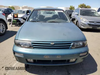 1995 Nissan Altima XE z VIN 1N4BU31D9SC148820, wystawiony jako Copart lot #69689864 z przebiegiem 326 420 mil mil oraz Czysty tytuł • Clean title. Historia ofert i sprzedaży dostępna na DreamBid. Obrazek 5.