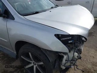 2006 Lexus RX 400h z VIN JTJHW31U660042456, wystawiony jako IAAI lot #41893361 z przebiegiem 162 061 mil mil oraz . Historia ofert i sprzedaży dostępna na DreamBid. Obrazek 14.