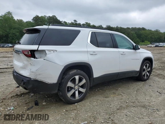 2021 Chevrolet Traverse LT with VIN 1GNEVHKWXMJ214024, listed as a Copart auction lot 56917015 with 68,829 mi miles and Salvage title. Bid and sale history available at DreamBid. Image 3.