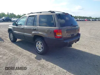 2001 Jeep Grand Cherokee Laredo with VIN 1J4GX48S91C559693, listed as a IAAI auction lot 42152103 with 152,713 mi miles and . Bid and sale history available at DreamBid. Image 3.