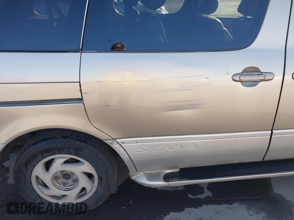 2000 Toyota Sienna LE with VIN 4T3ZF13C9YU189305, listed as a IAAI auction lot 42201168 with 218,254 mi miles and . Bid and sale history available at DreamBid. Image 6.